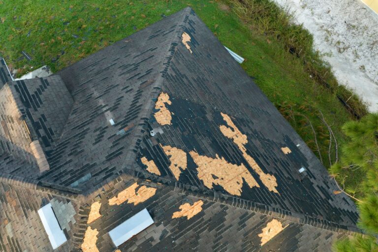 Roof With Storm Damage in need of emergency repair.